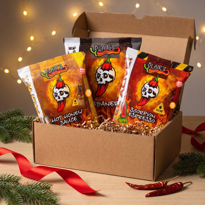 Blair's Chips 3er Set in einer Geschenkbox mit Tannenzweigen und roter Schleife